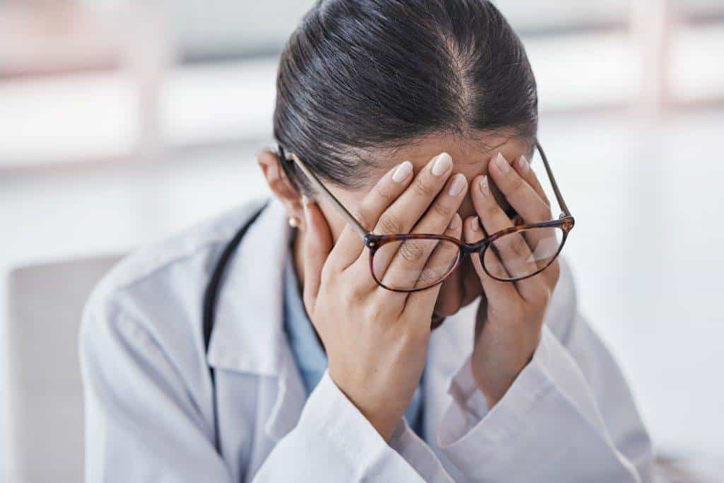 burnout stress or doctor woman with headache in o 2023 02 24 23 58 16 utc